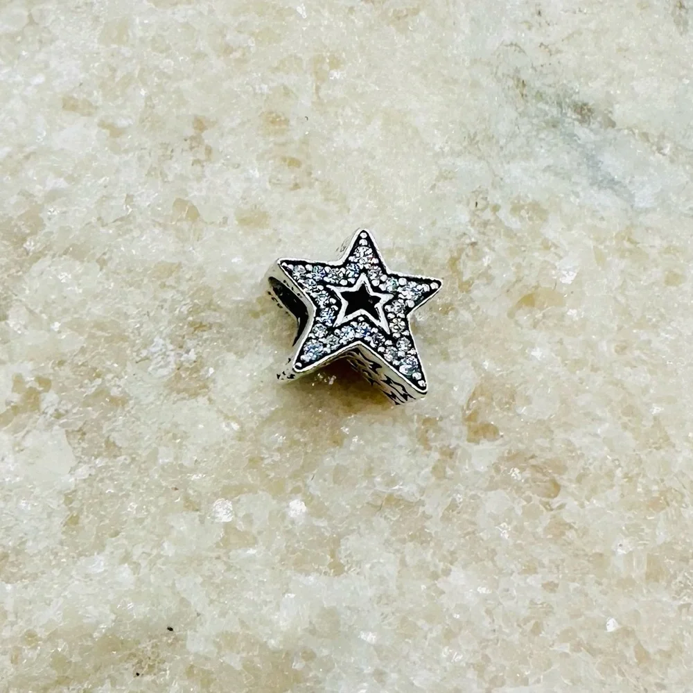 EUC Pandora 790016C01 Sterling Silver Asymmetric Star Charm w/ Clear CZ’s